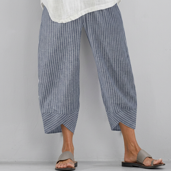 Comfortabele dames effen capribroek CJ26. Modieus ruimvallend design, perfect voor zomerse vrije tijd.