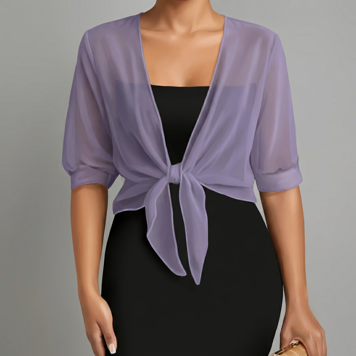 Elegant damesvestje met sjaalkraag en effen kleur. Een veelzijdige en comfortabele toevoeging aan de garderobe.