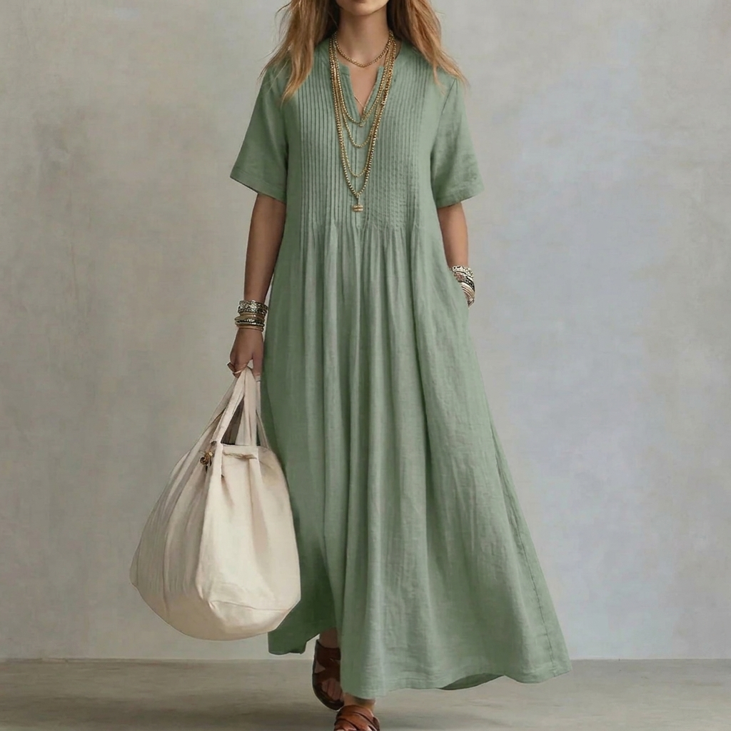 Casual elegante V-hals damesjurk met korte mouwen en geplooid detail. Comfortabele katoen-linnen zomer- of lentekleding.