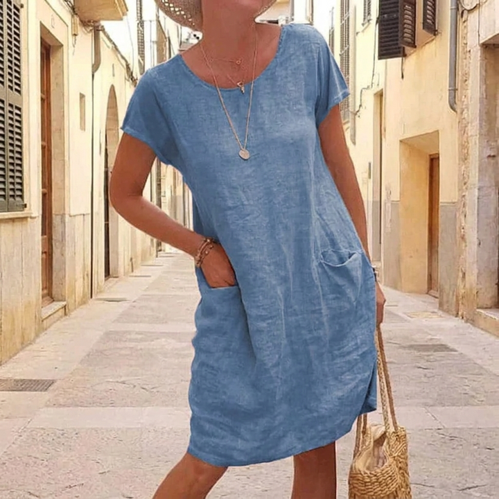 Casual damesjurk (CJ26), kort, effen model met handige zakken. Een comfortabele en stijlvolle keuze voor de zomer.