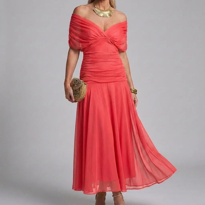 Trendy dames A-lijn maxi-jurk, V-hals en korte mouwen voor een modieuze zomerlook.
