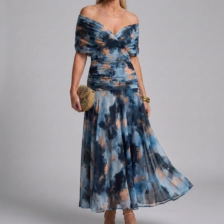 Modieuze dames maxi-jurk met V-hals, elegante A-lijn en zomerse uitstraling.