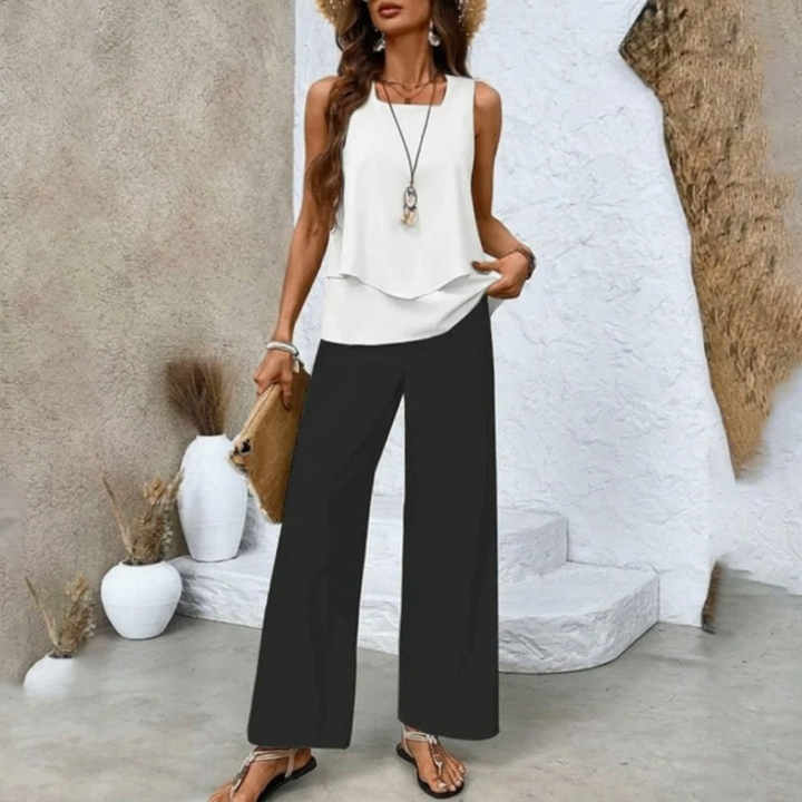 Modieuze dames zomer set met gelaagde top en wijde broek, ideaal voor casual of elegante vakantiedagen.