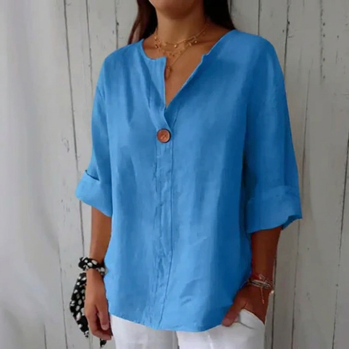 Elegante dames top met 3/4 mouw en V-hals. Comfortabele pasvorm, perfect voor lente en zomer.