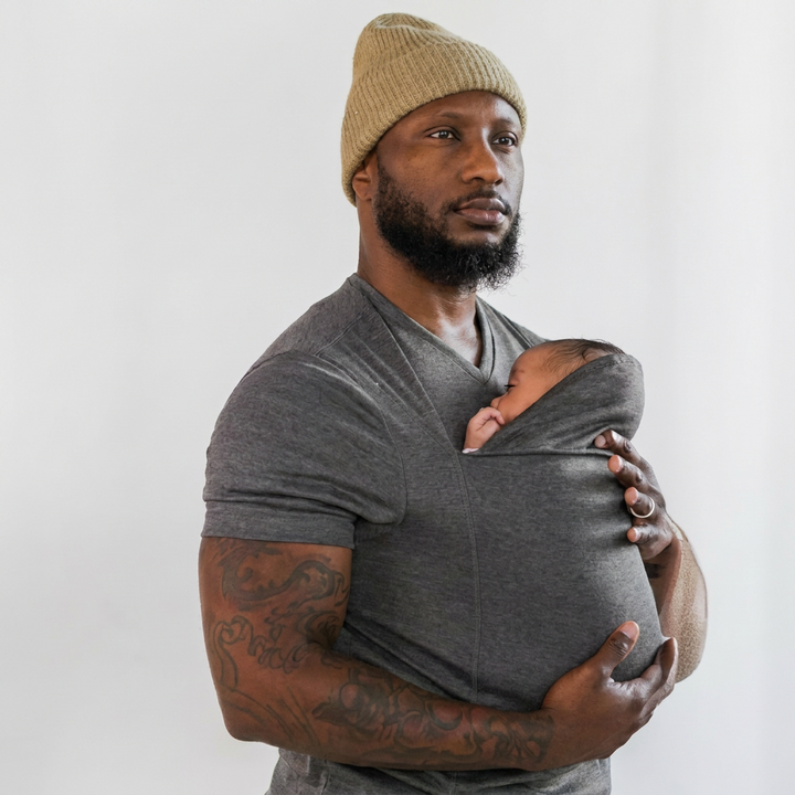 Praktisch unisex oudervest, combineert casual kleding met een babydrager. Comfortabel en stijlvol voor elke ouder.