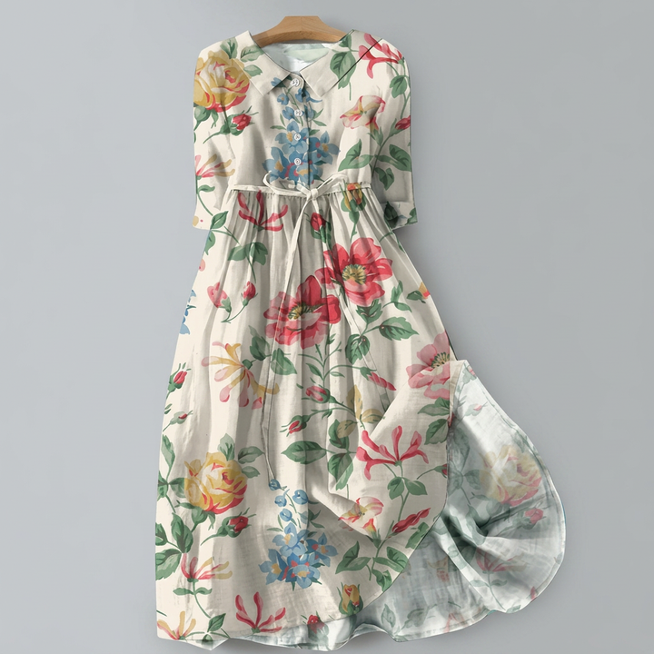 Elegante dames maxi-jurk met levendige bloemenprint. Bohemian stijl, perfect voor lente en zomer vakantie.