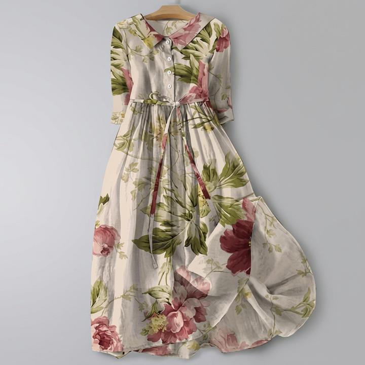 Comfortabele casual dames maxi-jurk met vrolijke bloemenprint. Ideaal voor vakantie en warme zomerdagen.