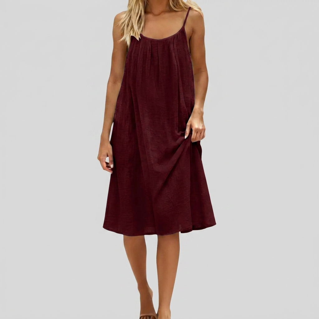 Comfortabele zomerjurk voor vrouwenmode, met mouwloze pasvorm, open rug en dunne spaghettibandjes.