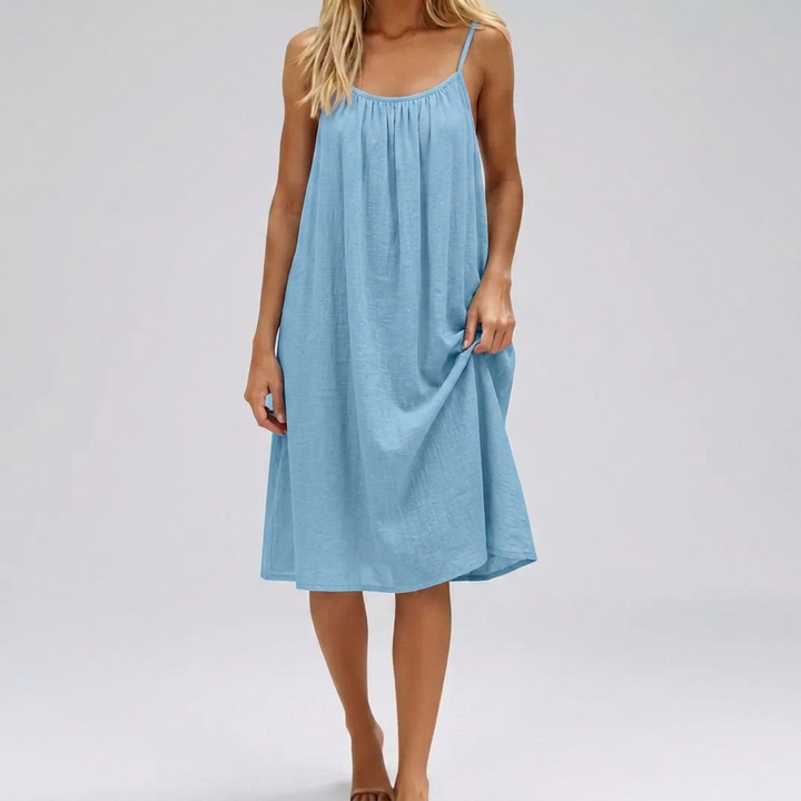 Chique casual damesjurk met open rug en verstelbare spaghettibandjes, voor elke zomerse gelegenheid.