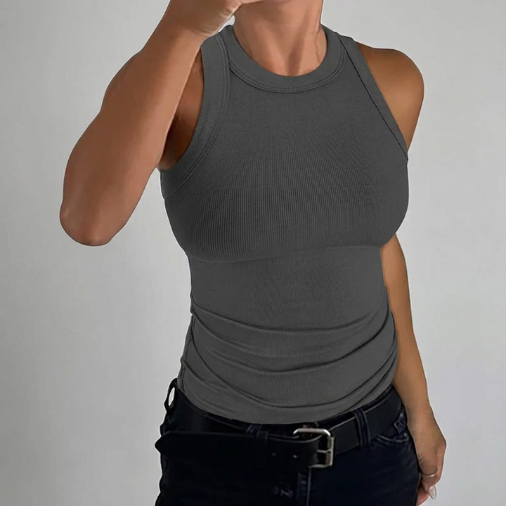 Trendy dames mouwloze top, geribbeld met hoge hals. Perfecte slim fit tanktop voor comfort en mode in de zomer.