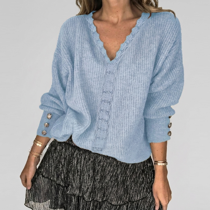 Modebewuste damesblouse met V-hals, comfortabele pasvorm en opengewerkte details, ideaal voor diverse outfits.