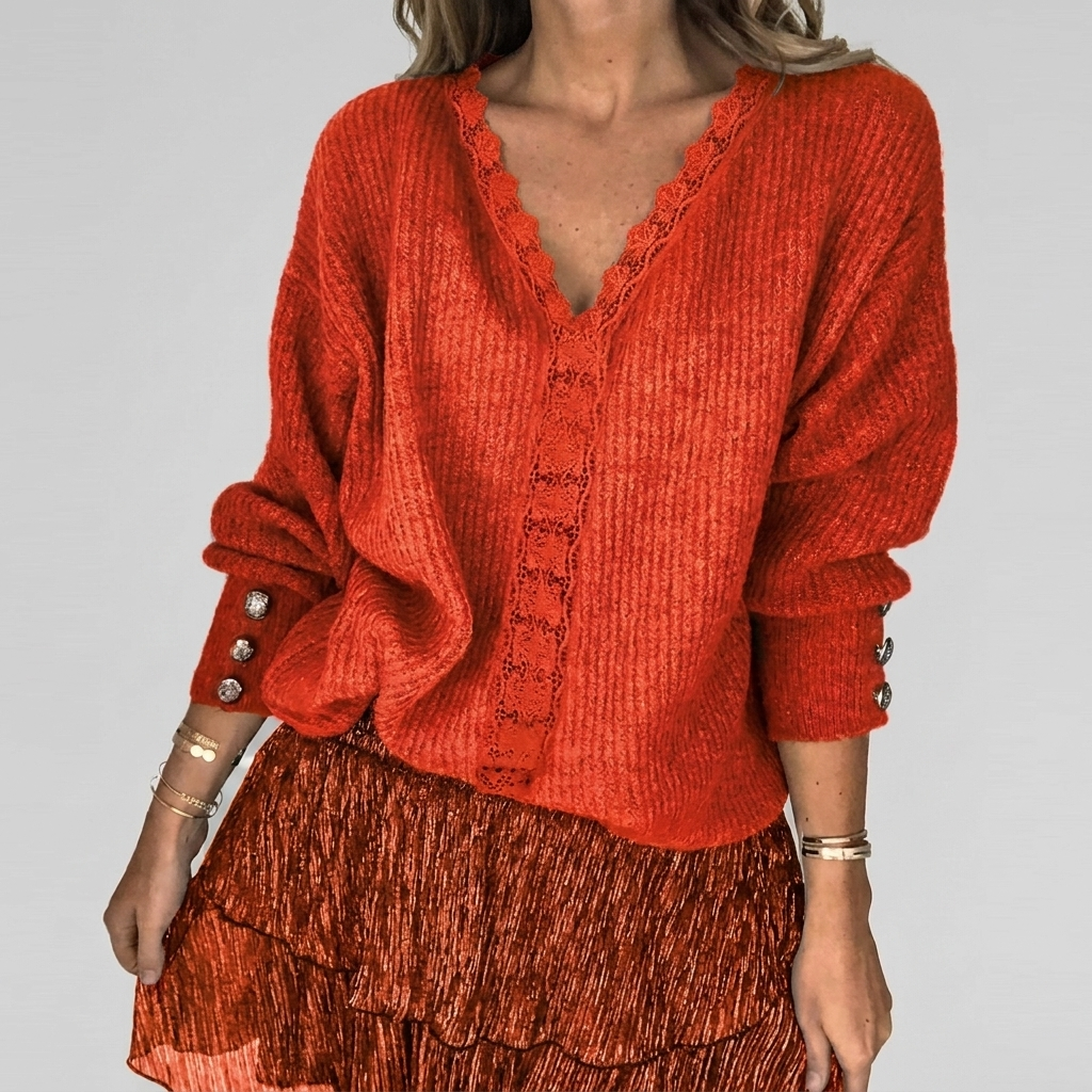 Damesblouse met chique opengewerkte accenten, V-hals en losse pasvorm, geschikt voor zowel casual als feestelijk.
