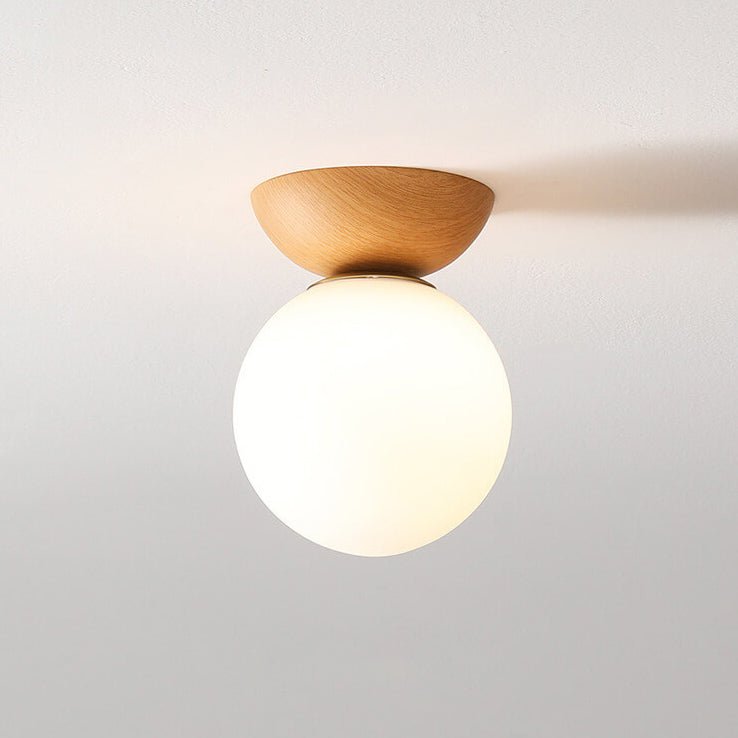 Hikari plafondlamp, minimalistisch LED design, walnoothout, strakke woonkamer verlichting.