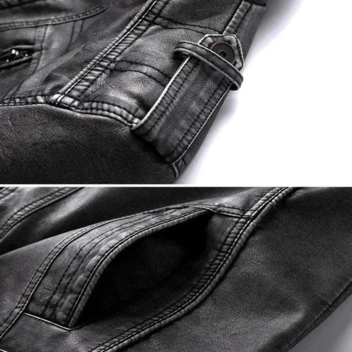Tijdloze zwarte herenjas met mandarijnkraag voor casual of smart-casual look. Met ritssluiting en epauletten.