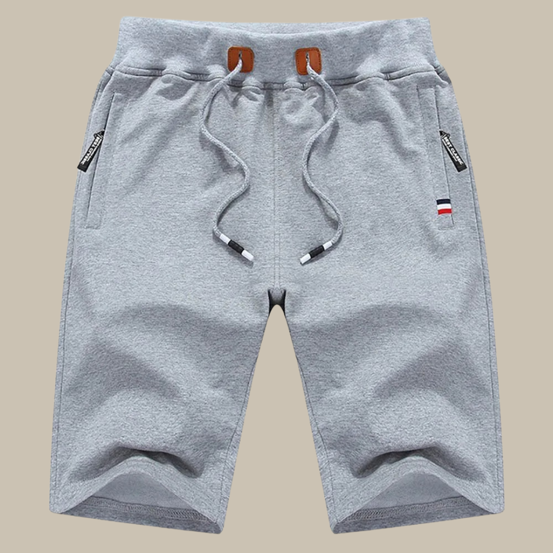Sportieve herenshorts, ideaal voor training en vrije tijd. Comfortabele pasvorm, ademend materiaal. Perfect voor zomer.