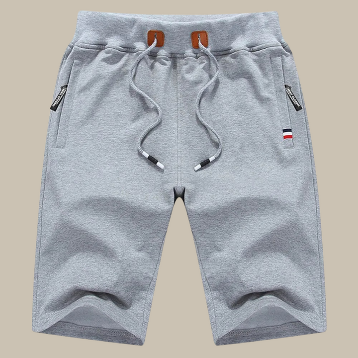 Sportieve herenshorts, ideaal voor training en vrije tijd. Comfortabele pasvorm, ademend materiaal. Perfect voor zomer.