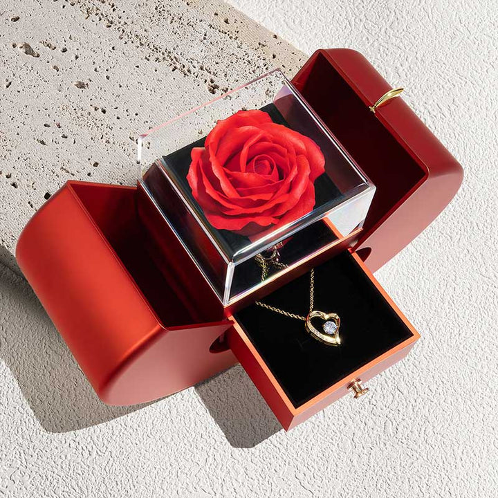 Dames sieradenset met eeuwige roos en liefdes collier, ideaal als romantisch geschenk met goud afwerking.