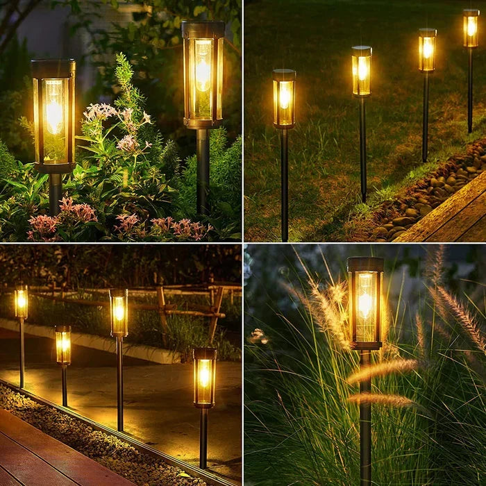 Sfeervolle LumiPath zonne-energie tuinlampen langs een pad, creëren een warme gloed voor avonden buiten.