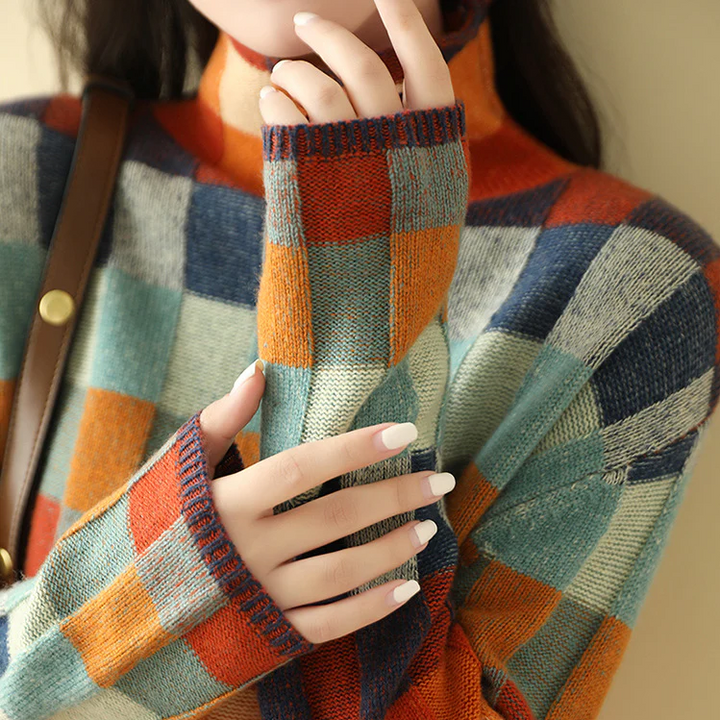 Modieuze Celeste dames coltrui van kasjmier. Warme, comfortabele trui met elegante hoge hals voor de winter.