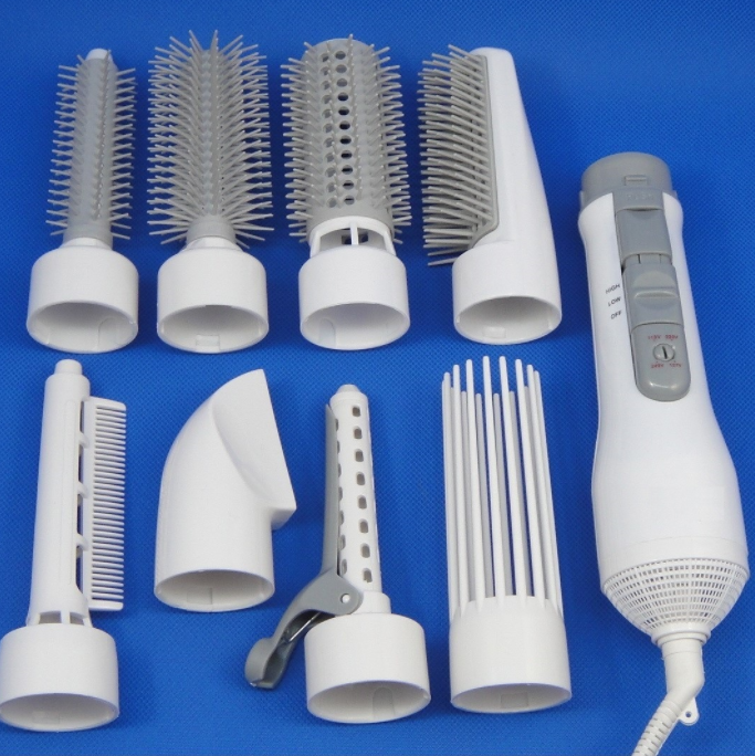 Dames haarstylingtool met ergonomisch ontwerp en 7-in-1 functionaliteit. Geschikt voor alle haarverzorging en kapselwensen.