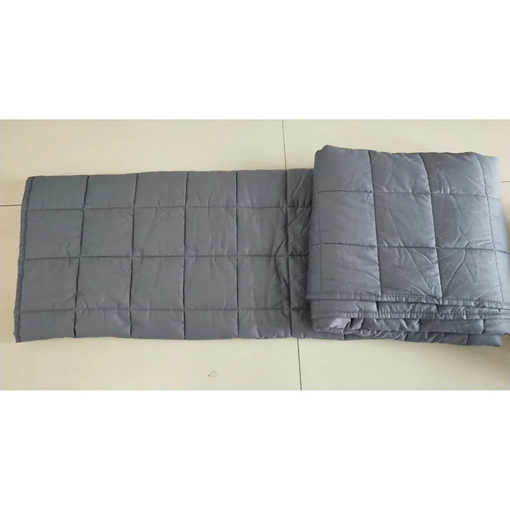GardenFeel BlueBliss verzwaarde deken op bed, perfect huistextiel voor een kalmerende anti-stress en diepe slaap.