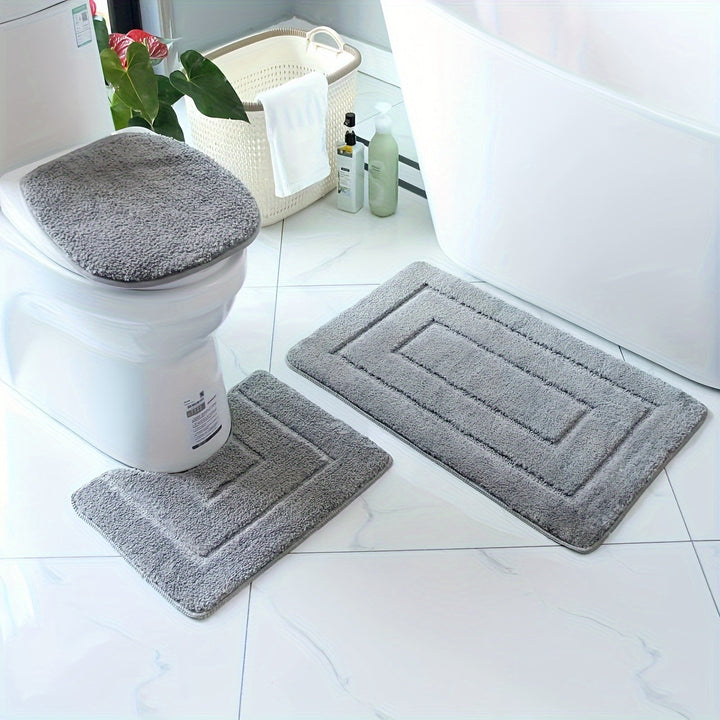 Complete set van comfortabele badmatten. Zacht, antislip en wasbaar voor een veilige, luxe badkamer.