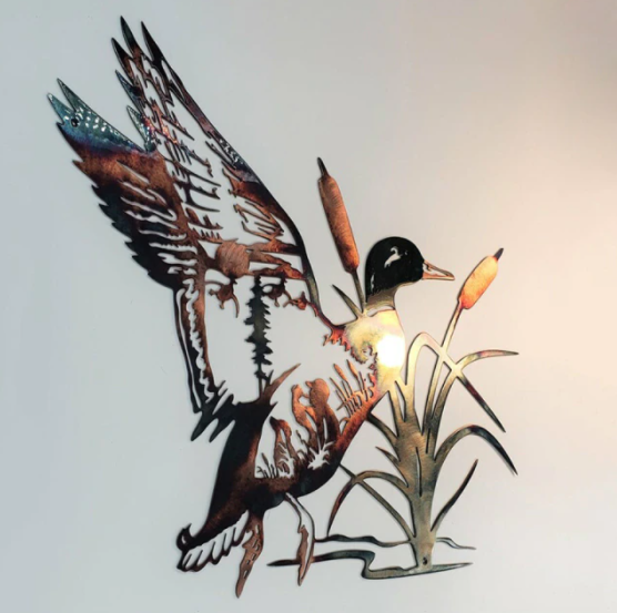 Decoratieve metalen wanddecoratie met modern design. Creëert een stijlvolle sfeer in huis.