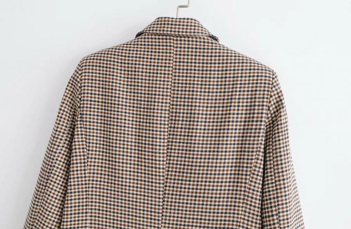 Dames business blazer in tijdloos grijs, essentieel kledingstuk voor een professionele en elegante uitstraling.