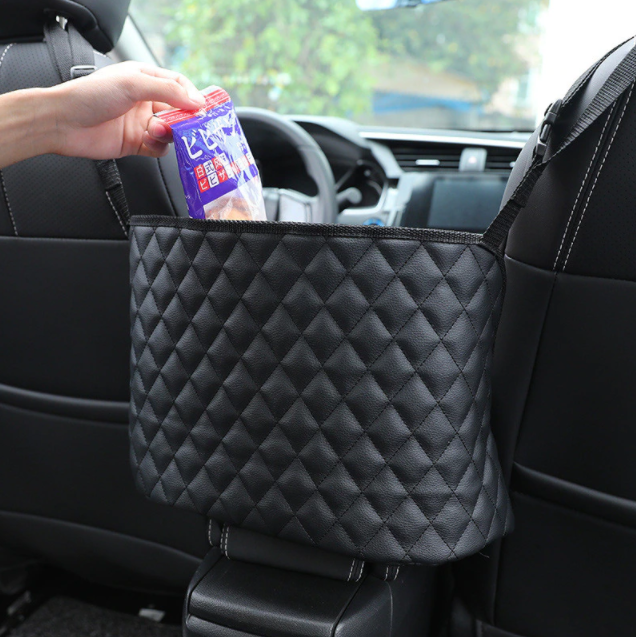Handige auto organizer van leer, perfect voor telefoons, sleutels en snacks. Houd je auto netjes en georganiseerd.