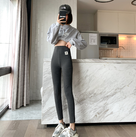 Stijlvolle zwarte dames winterlegging met hoge taille voor buikcontrole & optimale warmte.