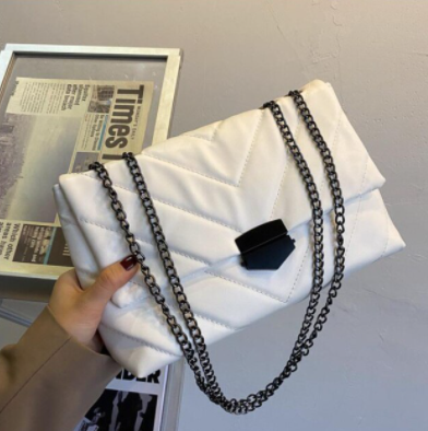 Compacte en stijlvolle dames handtas van PU leer met ketting, praktisch en modieus.