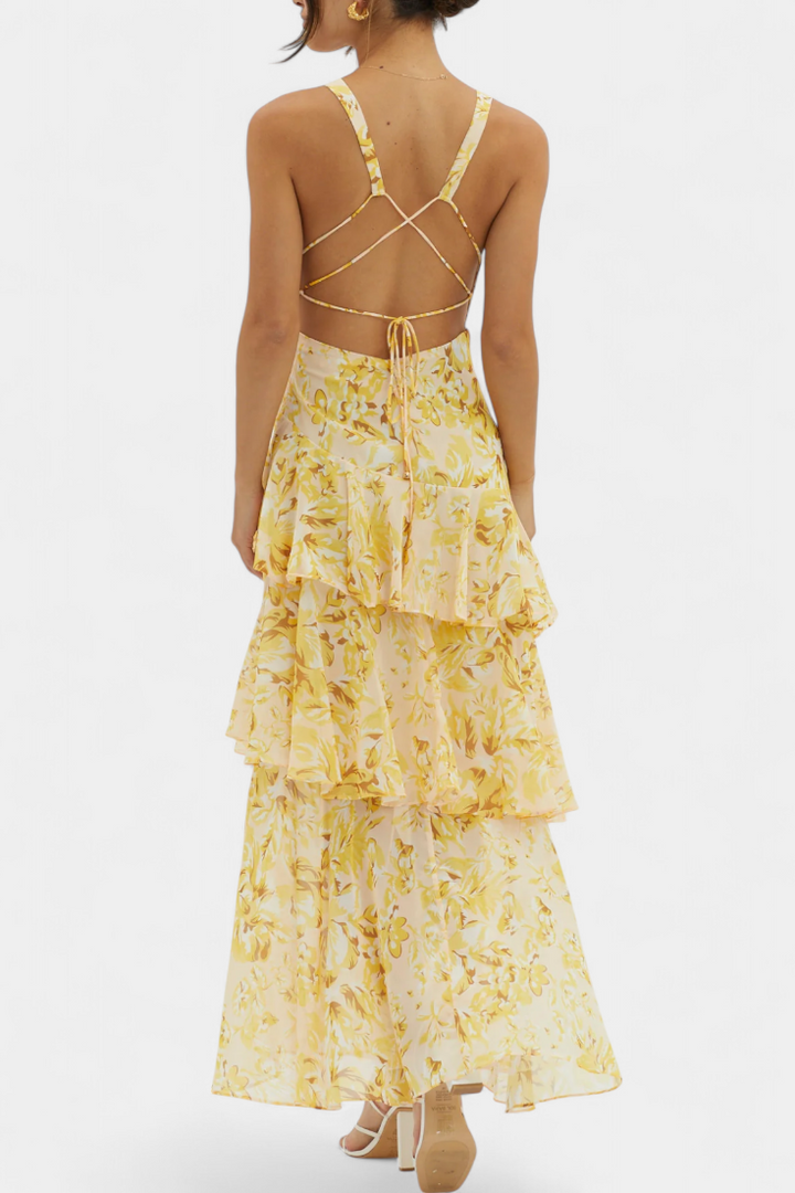 Vloeiende damesjurk met V-hals, ideaal voor zomerse dagen, of als elegante avondjurk voor feesten.