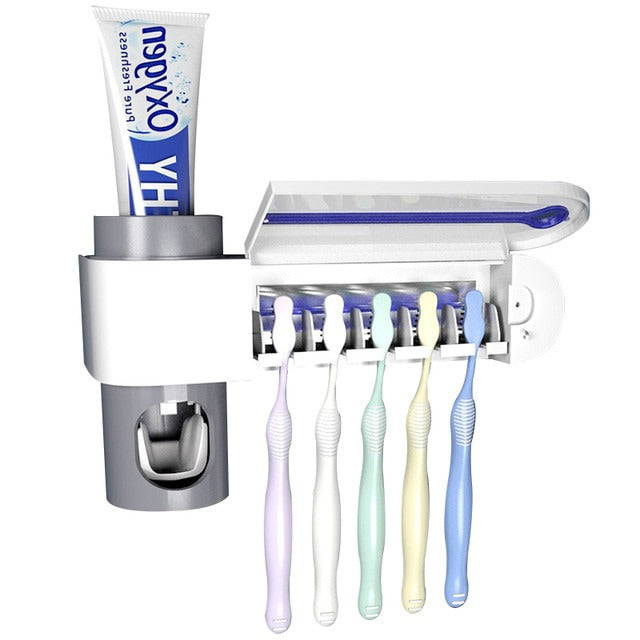 Wandgemonteerde UV tandenborstelhouder & automatische tandpasta dispenser; ideaal voor gezinsmondverzorging.