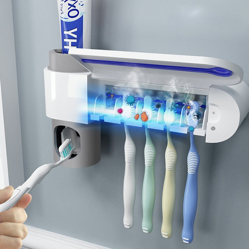 UV tandenborstelsterilisator en tandpasta dispenser voor hygiënische badkamer; doodt bacteriën effectief.