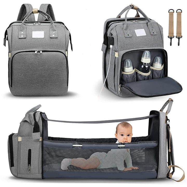 Smart Mama luiertas met uitklapbaar babybedje en USB-oplaadpoort, ideaal voor onderweg met baby.