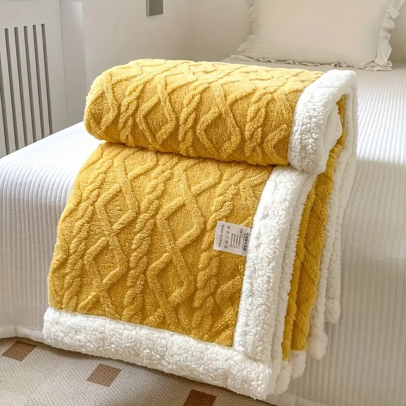 Diverse kleuren sherpa dekens; een zachte fleece plaid die warmte en comfort biedt als stijlvolle woondeken of bankplaid.