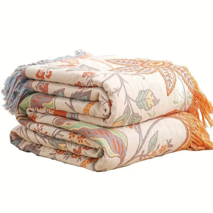 Stijlvol multifunctioneel katoenen deken met bohemien franjes, ideaal als picknickkleed, plaid of strandlaken.