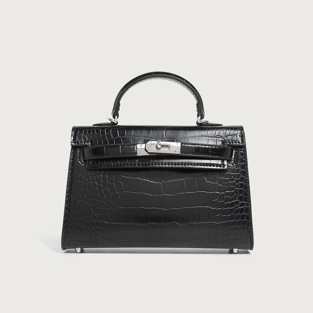 Elegante zwarte dames schoudertas van veganistisch leer. Perfect als stijlvolle handtas of crossbody accessoire.