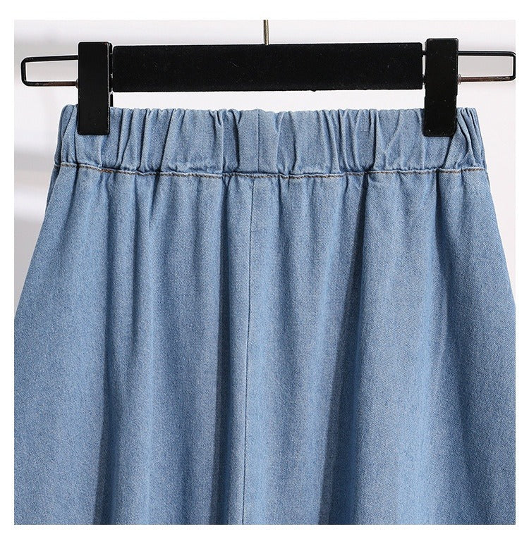 Zomerse elegante dames midirok met elastische taille en sierlijke knopen, geschikt voor elke gelegenheid.
