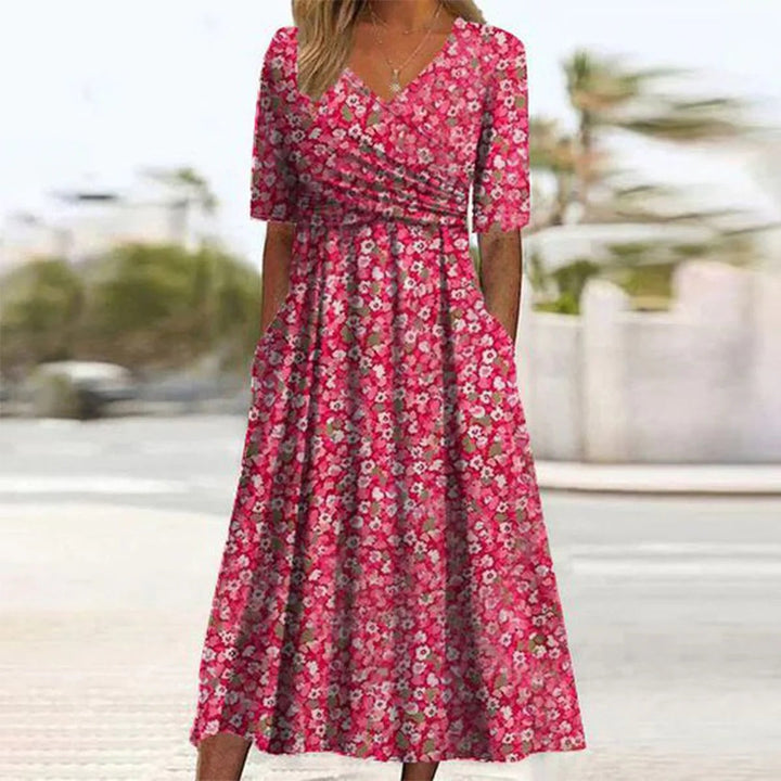 Comfortabele dames midi jurk met V-hals, perfect voor dagelijks gebruik of speciale evenementen; tijdloze elegantie.