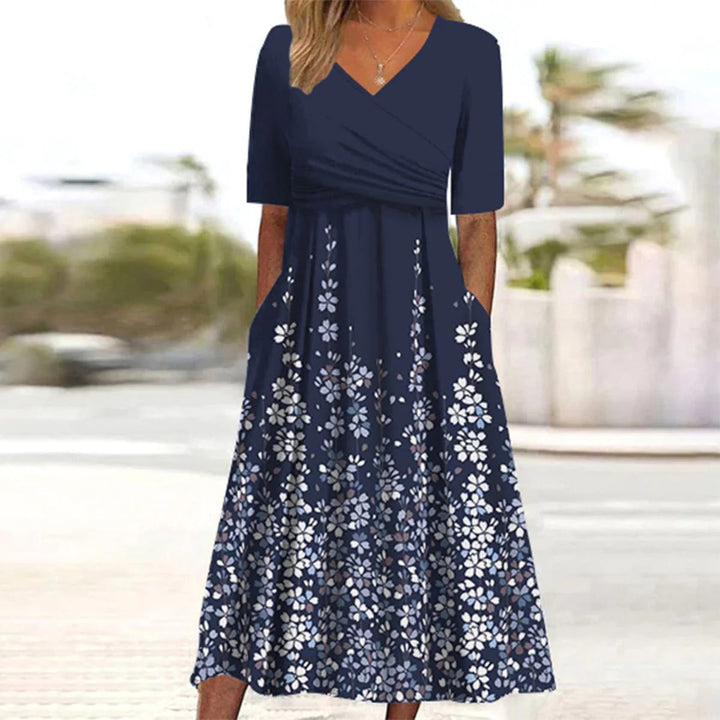 Veelzijdige damesjurk, midi lengte, met chique V-hals design, geschikt als zomerjurk of lente kleding.