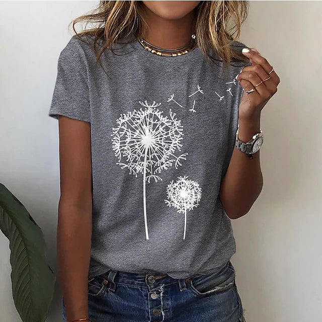 Dames losvallend T-shirt met opvallende paardenbloemprint. Comfortabele zomerkleding met korte mouwen, trendy en luchtig.
