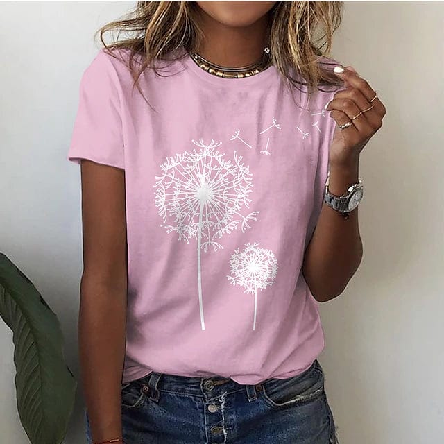 Speels, losvallend dames T-shirt met een opvallende paardenbloemprint. Geschikt voor casual mode en zomerse dagen.