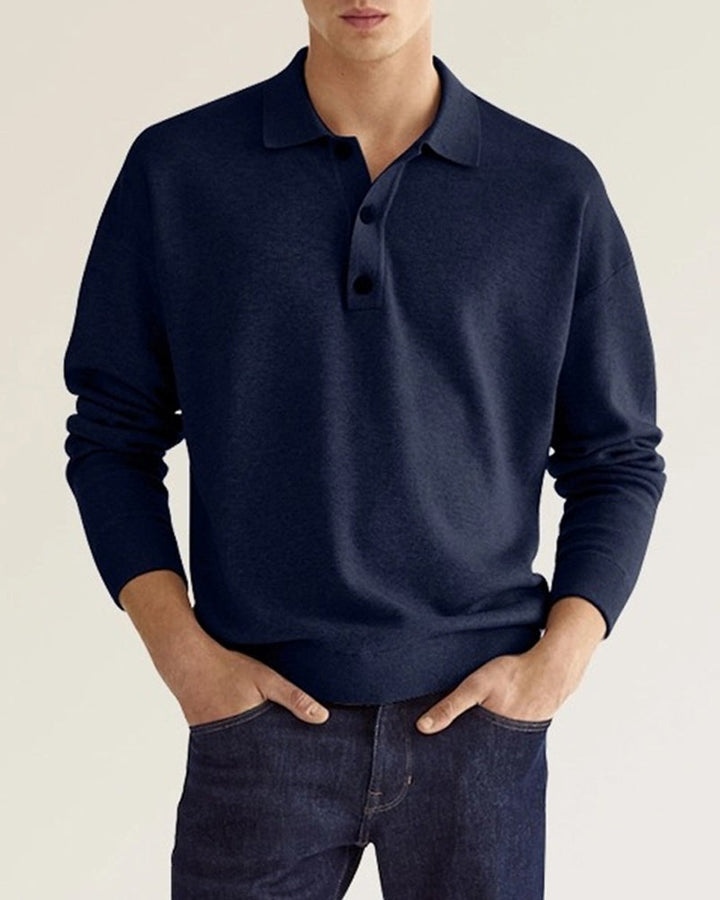Mannelijke herenpolo met lange mouwen en knoopsluiting. Een effen, tijdloos design voor veelzijdige herenmode.