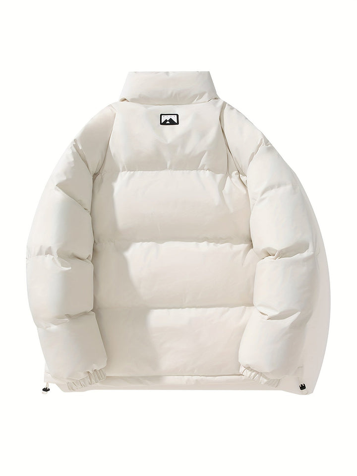 Hoogwaardig heren pufferjack, warm en winddicht. Geschikt als winterjas met comfortabele opstaande kraag voor elke man.