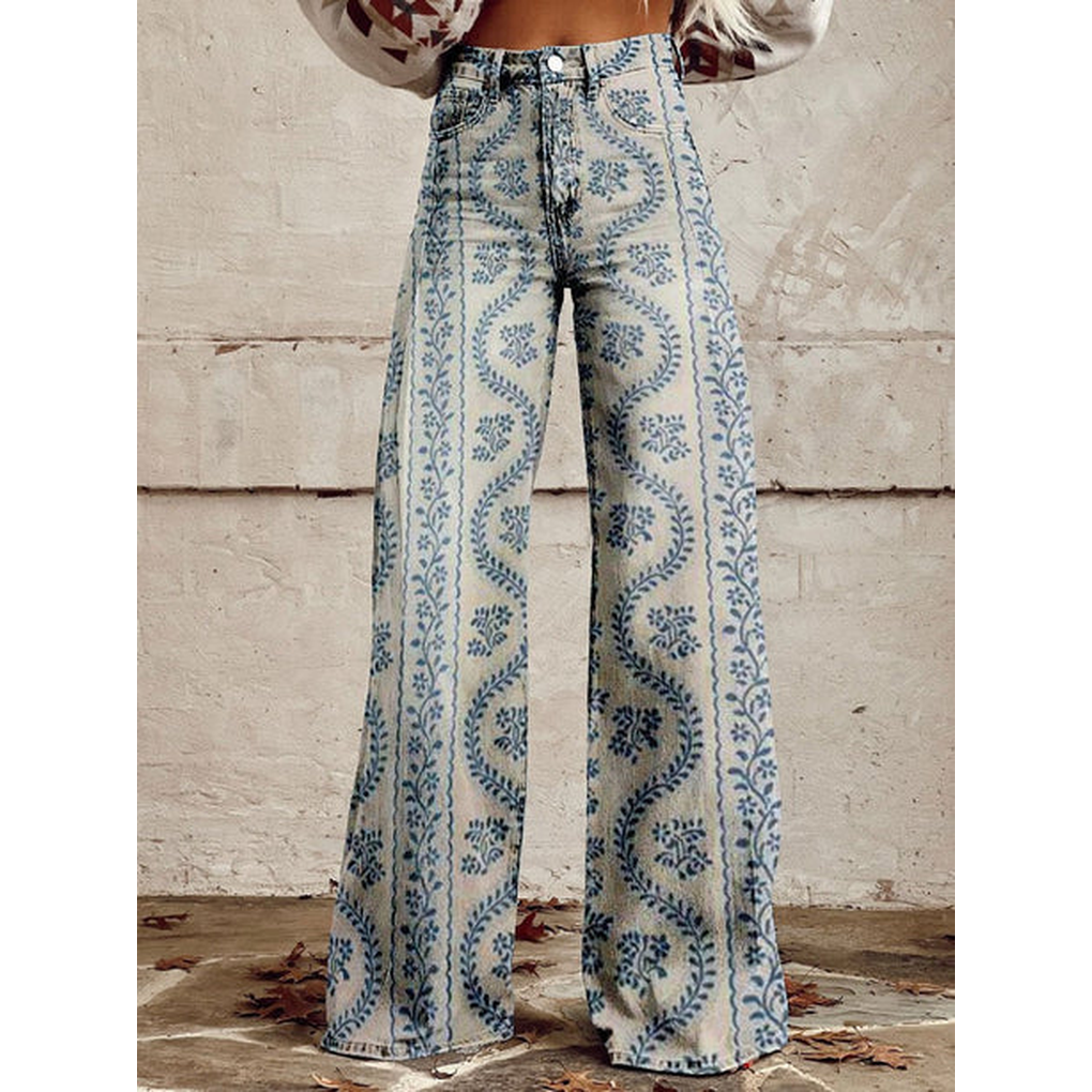 Elegante dames wijde pijpen broek met levendige bloemenprint. Casual zomerbroek van stretch polyester.