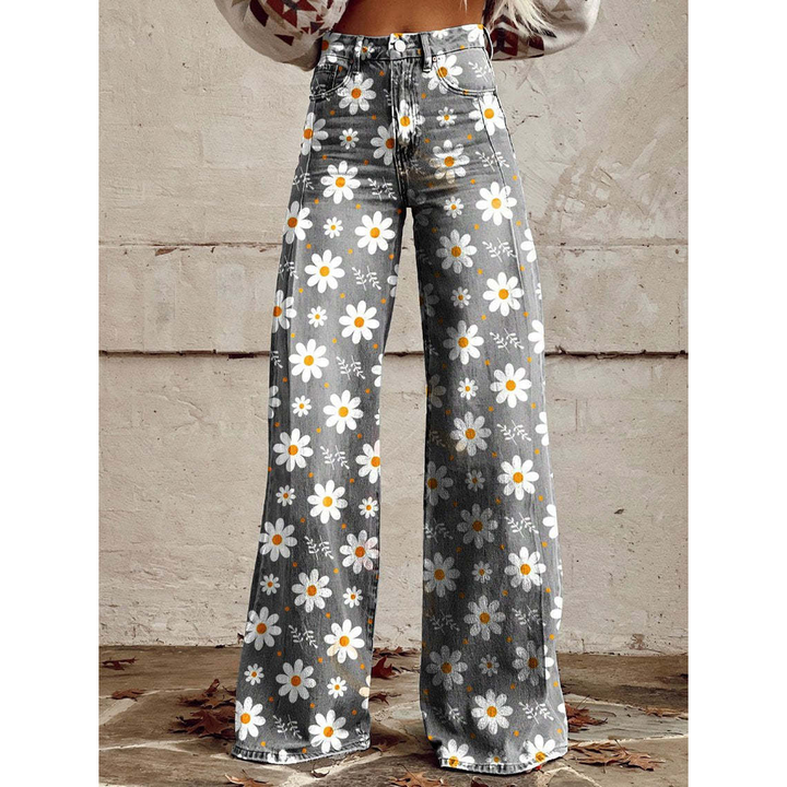 Dames wijde pijpen broek met trendy bloemenprint. Comfortabele stretch polyester zomerbroek voor fashion.