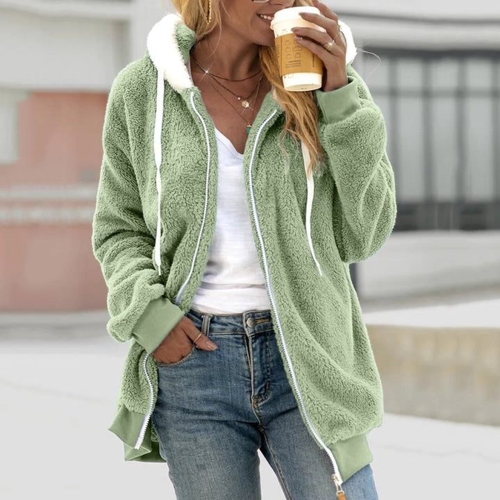 Dames teddy vest Emilia: Oversized, warm en comfortabel vest met rits, ideaal voor wintermode.