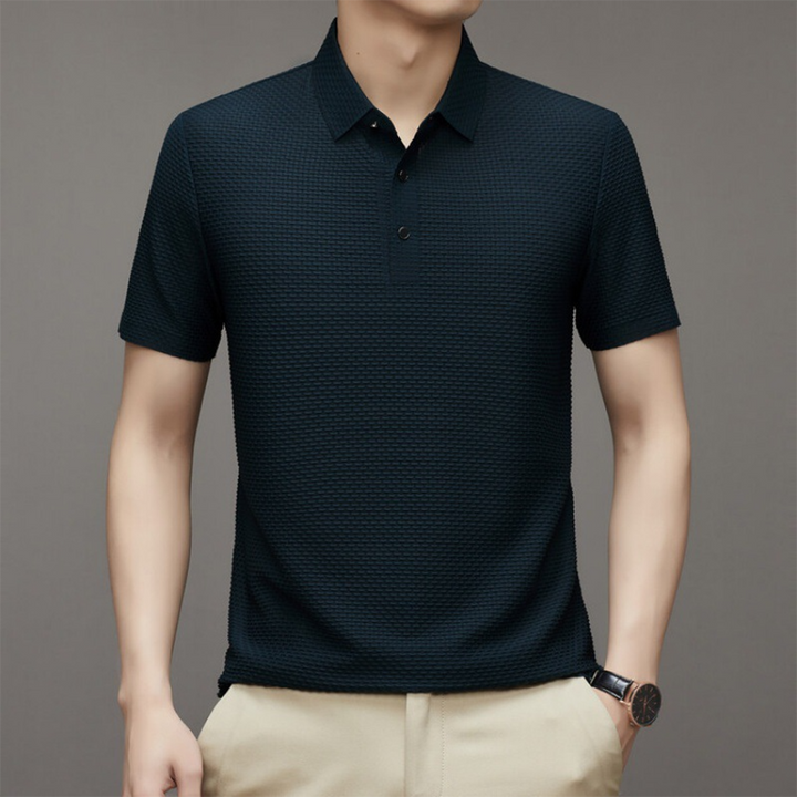 Stijlvol heren poloshirt met knoopkraag, ideaal voor smart casual en zakelijke outfits. Comfortabel en veelzijdig.