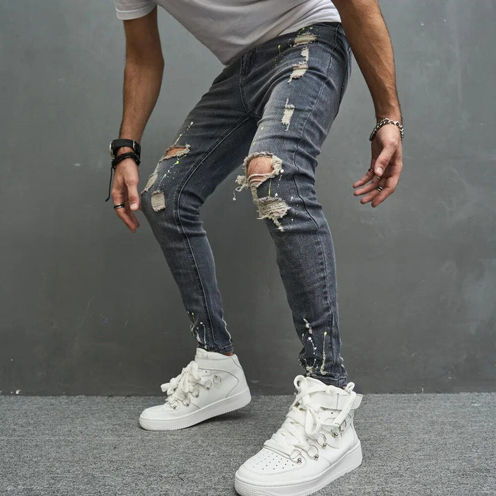 Moderne herenjeans: rekbare skinny fit met trendy scheuren, combineert stijl en draagcomfort perfect.